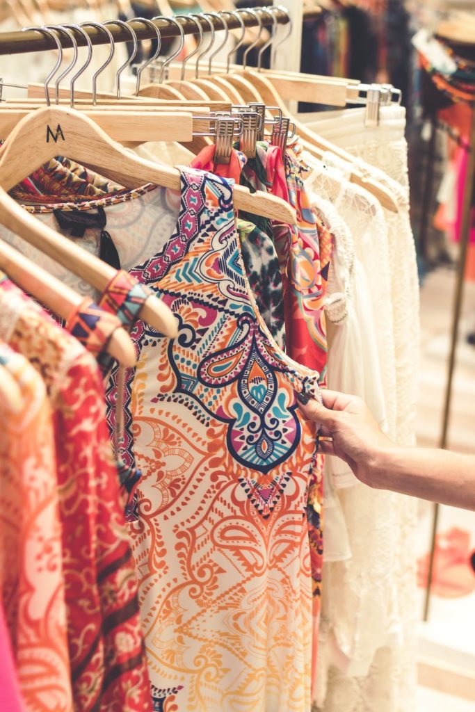 Make money on selling your clothing colorful clothing on rack