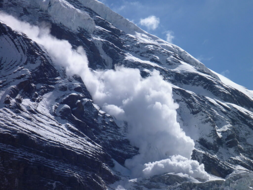 Debt Avalanche picture of avalanche of snow coming down mountain at the slope of Dhauligiri